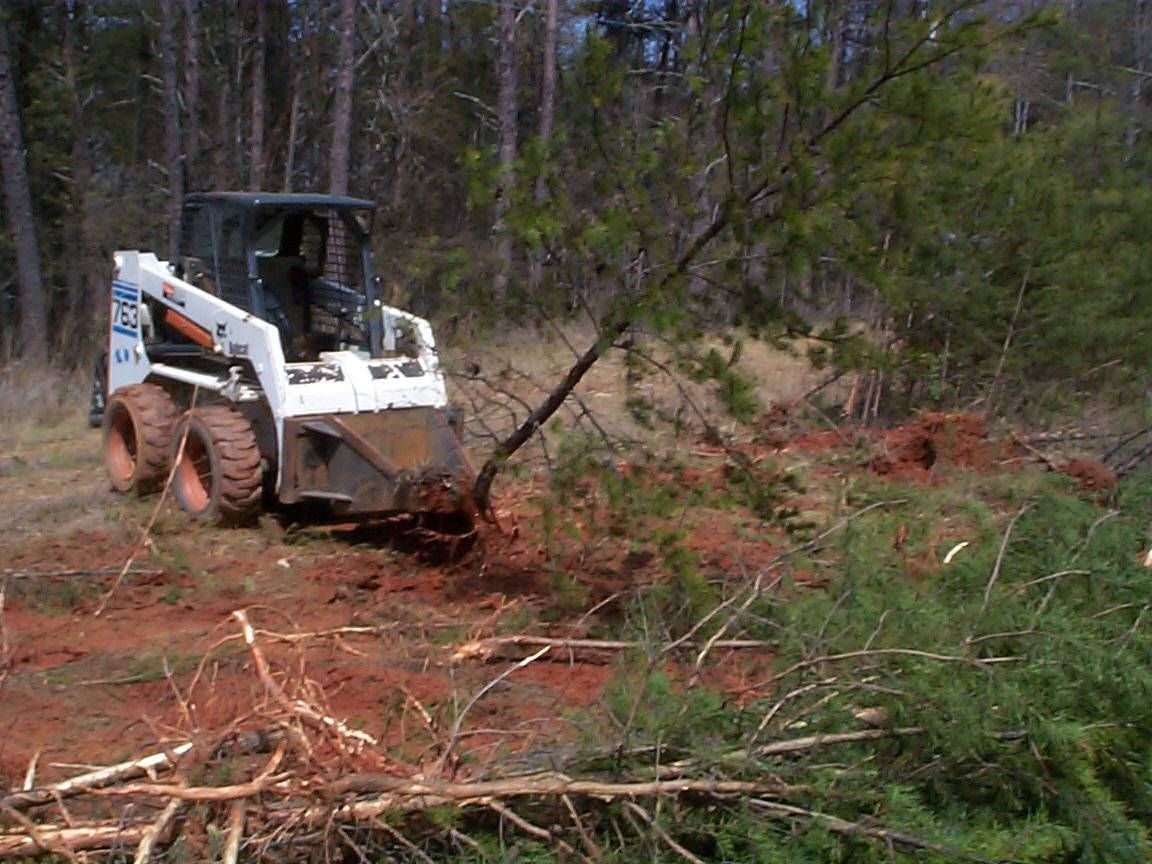 Bulldozer Used for Land Clearing — Spartanburg, SC — AAA Bobcat & Landscaping