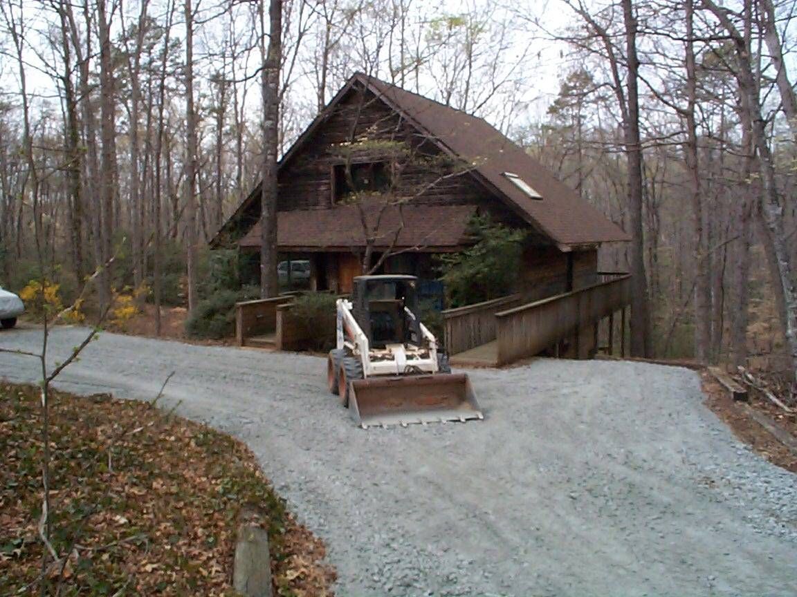Bulldozer in Front of the House — Spartanburg, SC — AAA Bobcat & Landscaping