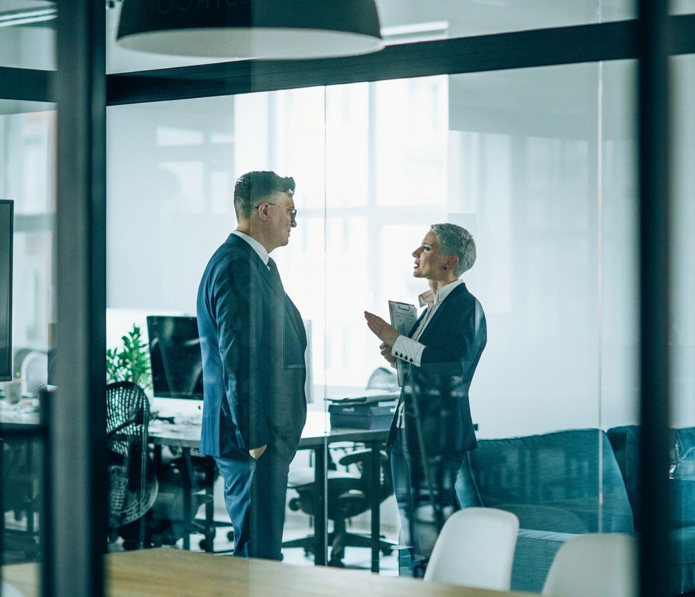 Man and Woman Discussing Privately — Mount Gambier, SA — Kyrimis Lawyers