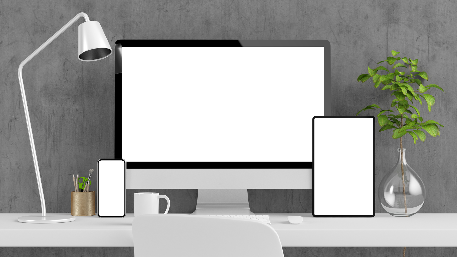 An image showcasing a desktop computer, tablet, and smartphone placed on a desk for the web design section of Rawlings Media's website. The devices have blank white screens, symbolizing the versatility and expertise of Rawlings Media in designing responsive and visually appealing websites across various devices.