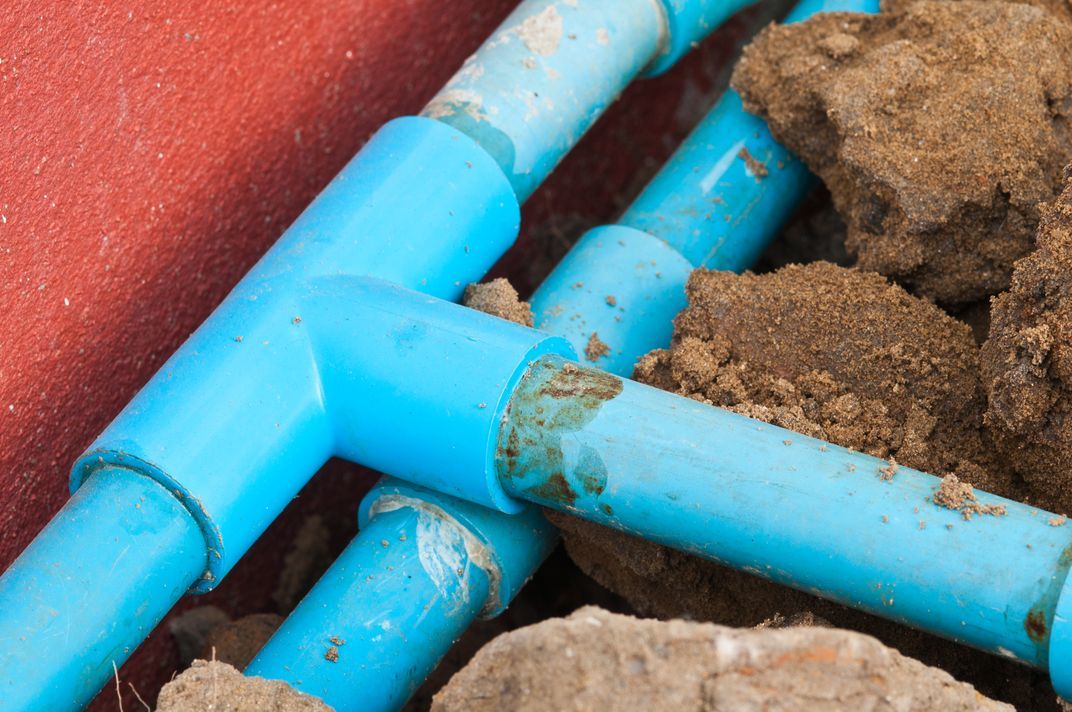 Old blue plumbing pipes