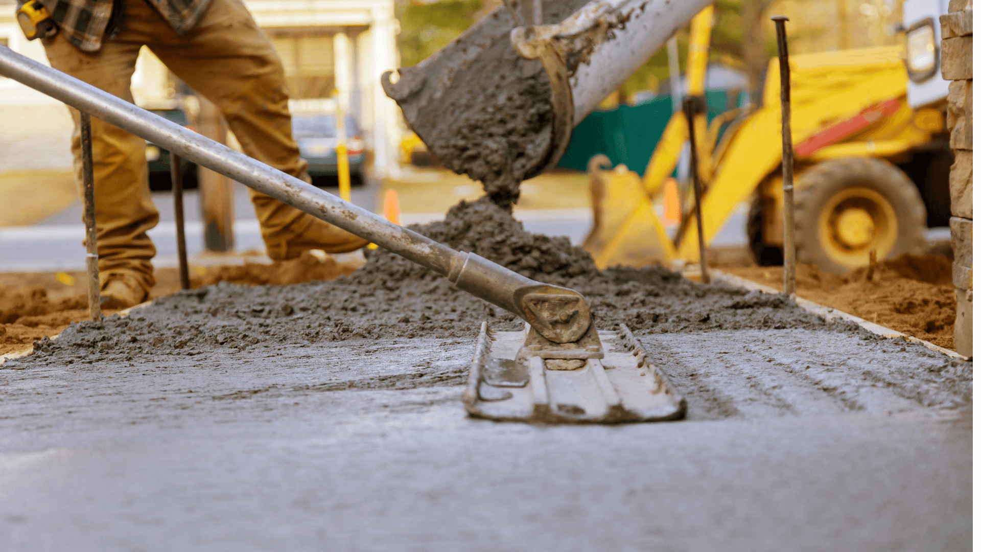 Concrete contractors pouring a new driveway in Gilbert, AZ