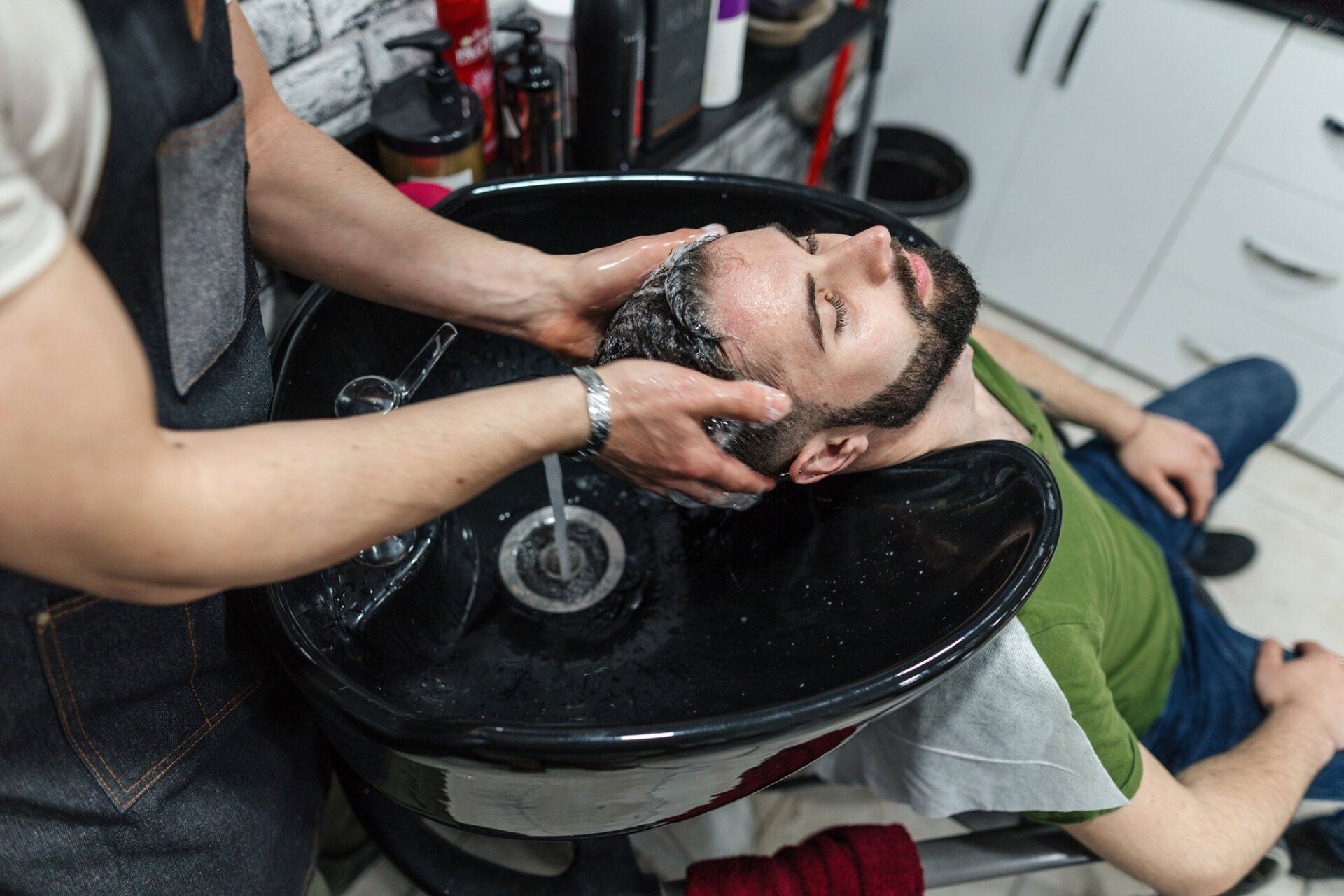 Client Getting Hair Shampoo — Grove City, FL — The Gentlemen's Grooming Shop