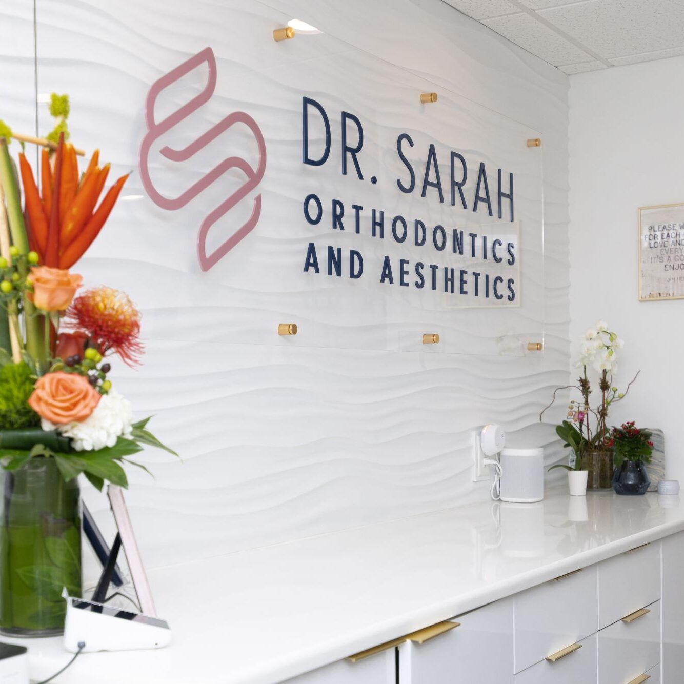 a sign for dr. sarah orthodontics and aesthetics