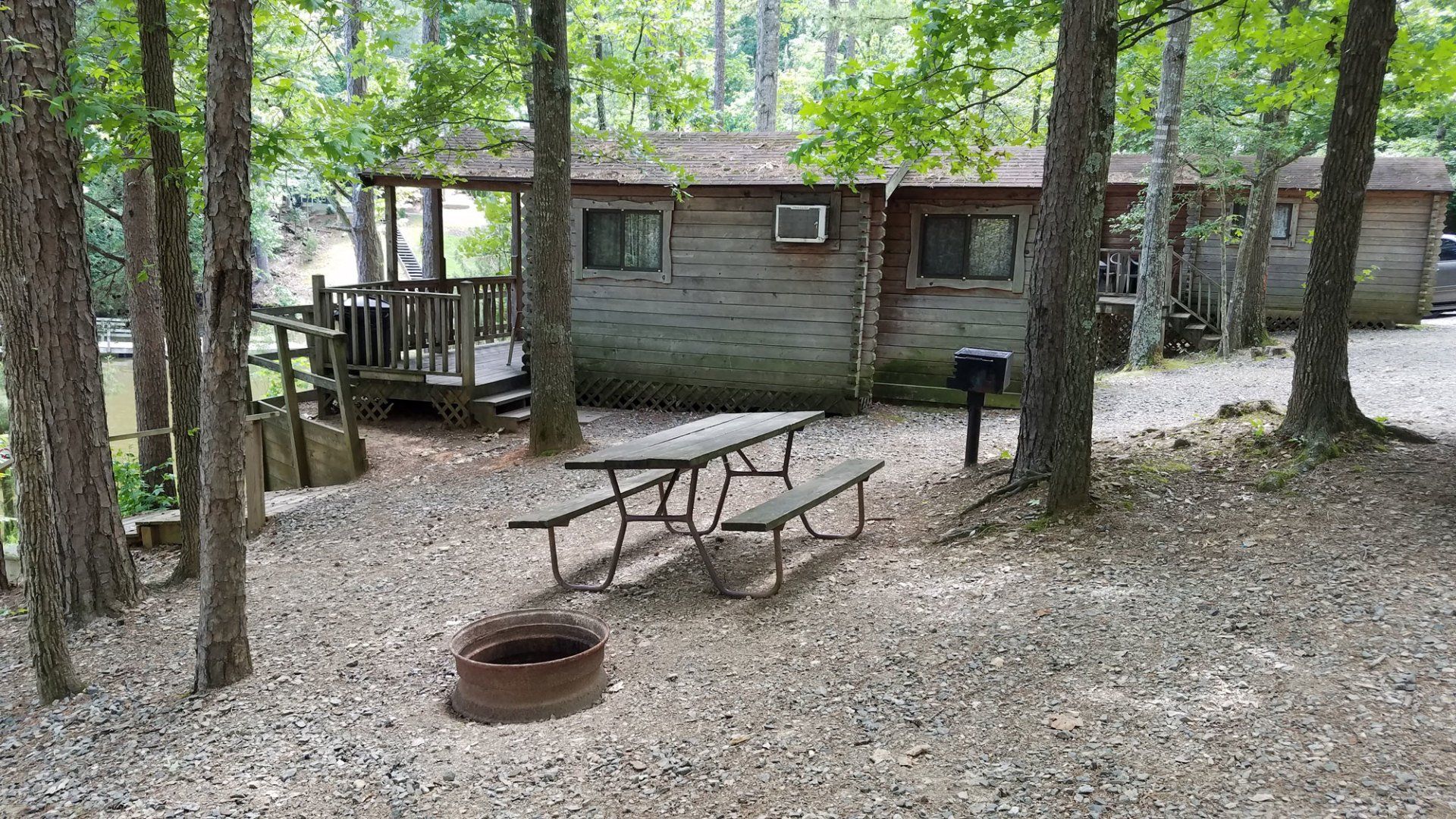 Exterior view of cabins and picnic area at High Rock Lake Campground