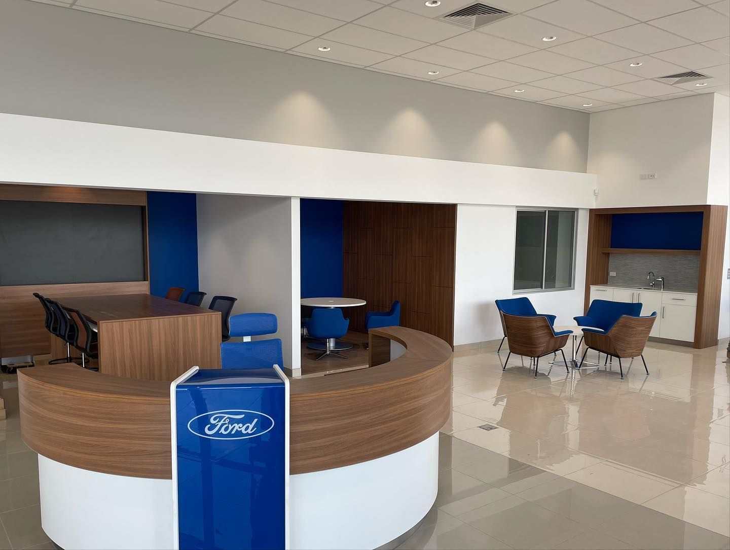 Ford Dealership Interior With Reception Desk, Seating Areas, and Meeting Space — Rowal Constructions in Newcastle, NSW