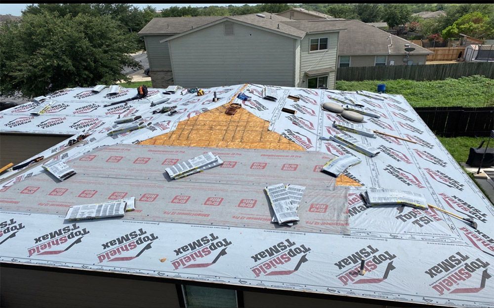 A roof is being installed on a house in San Antonio, TX.