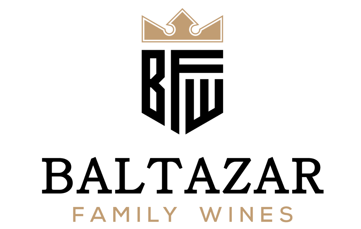 The logo for baltazar family wines has a crown on it.
