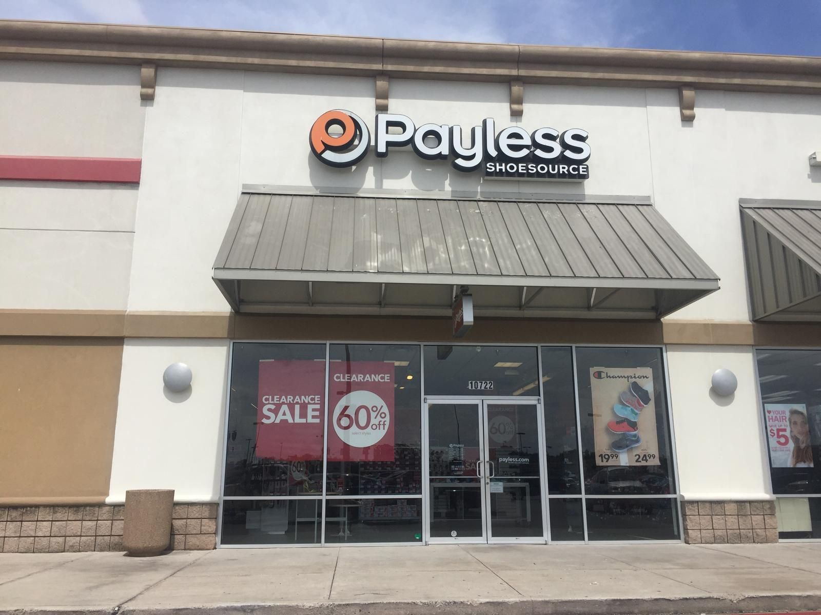 Payless ShoeSource store with a grand sale sign, and a tan facade.