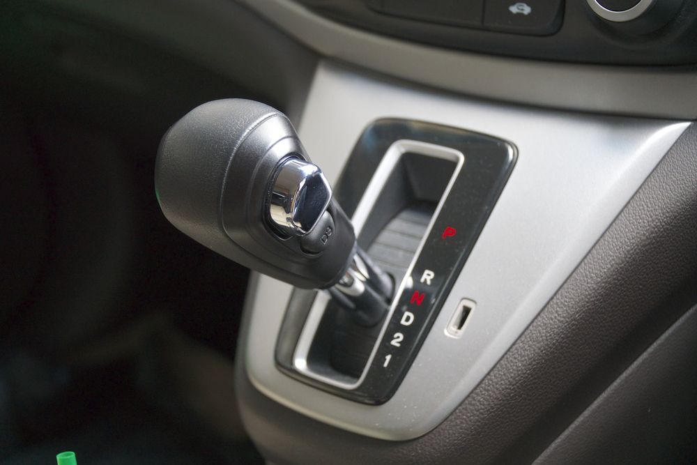 A Close Up Of A Car 's Shifter With The Letters R And D On It — Absolute Transmissions NQ In Hyde Park, QLD
