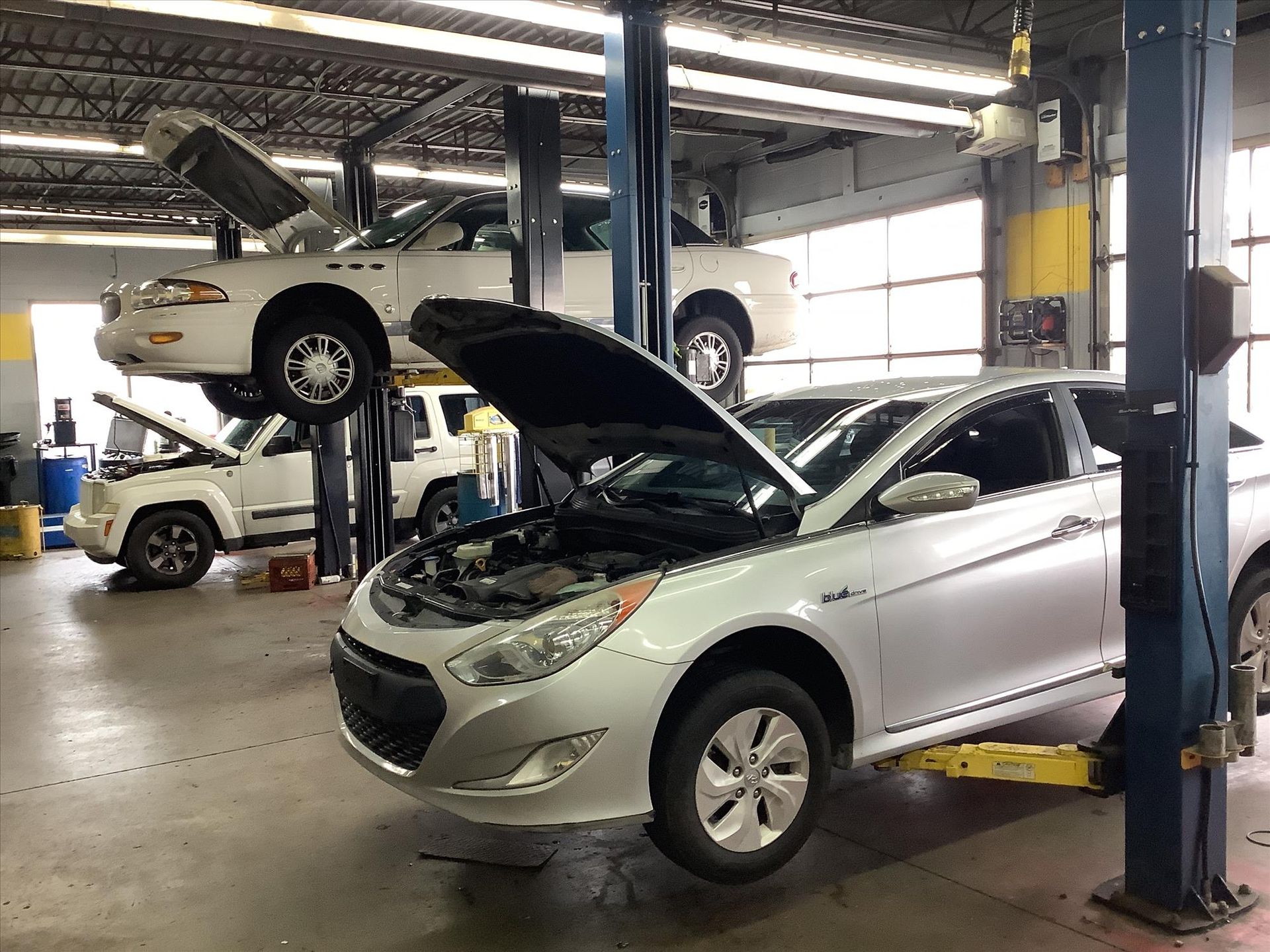 Cars Inside Auto Shop | Sparks Auto Care