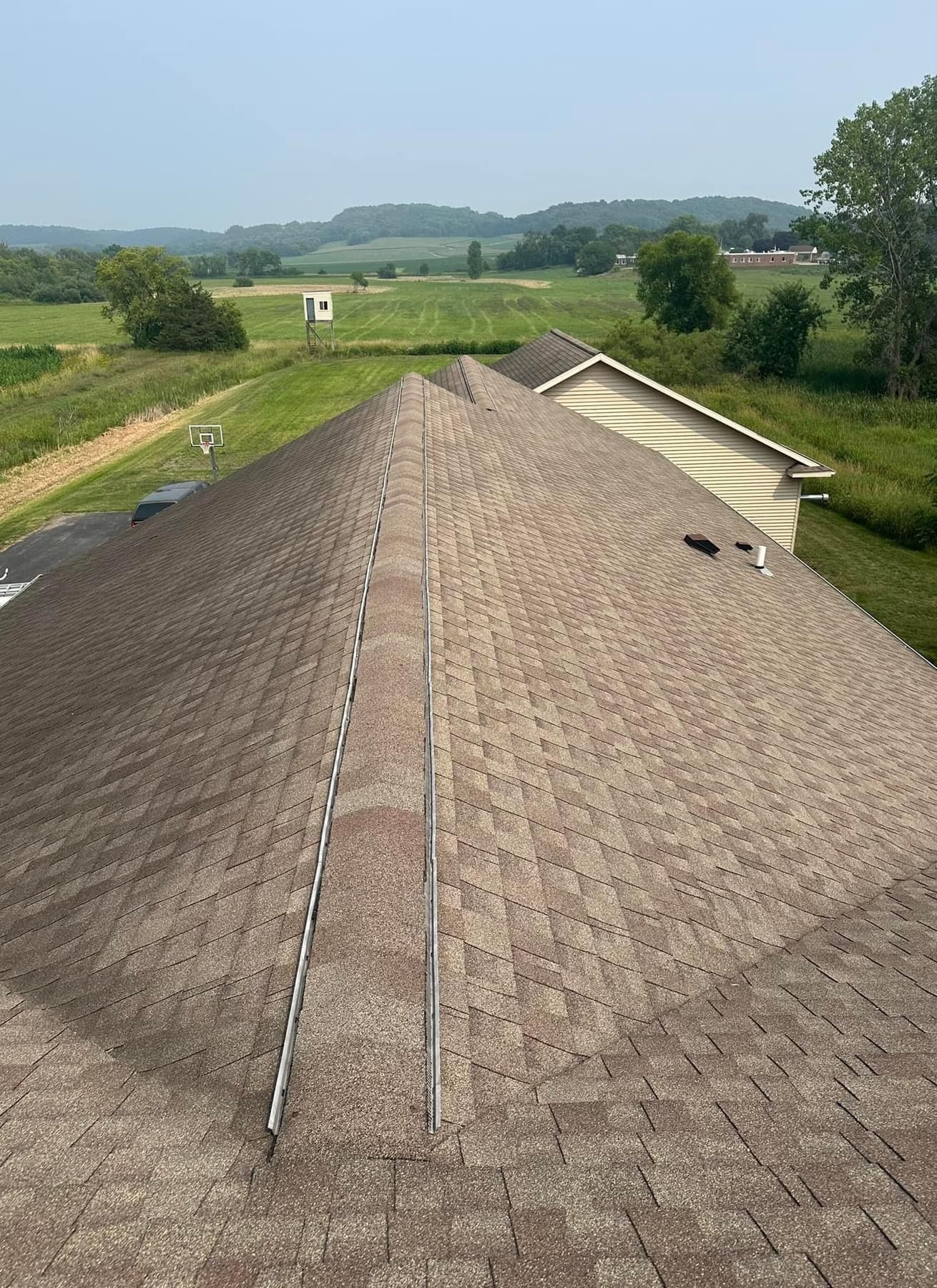 the roof of a house with a lot of shingles on it .