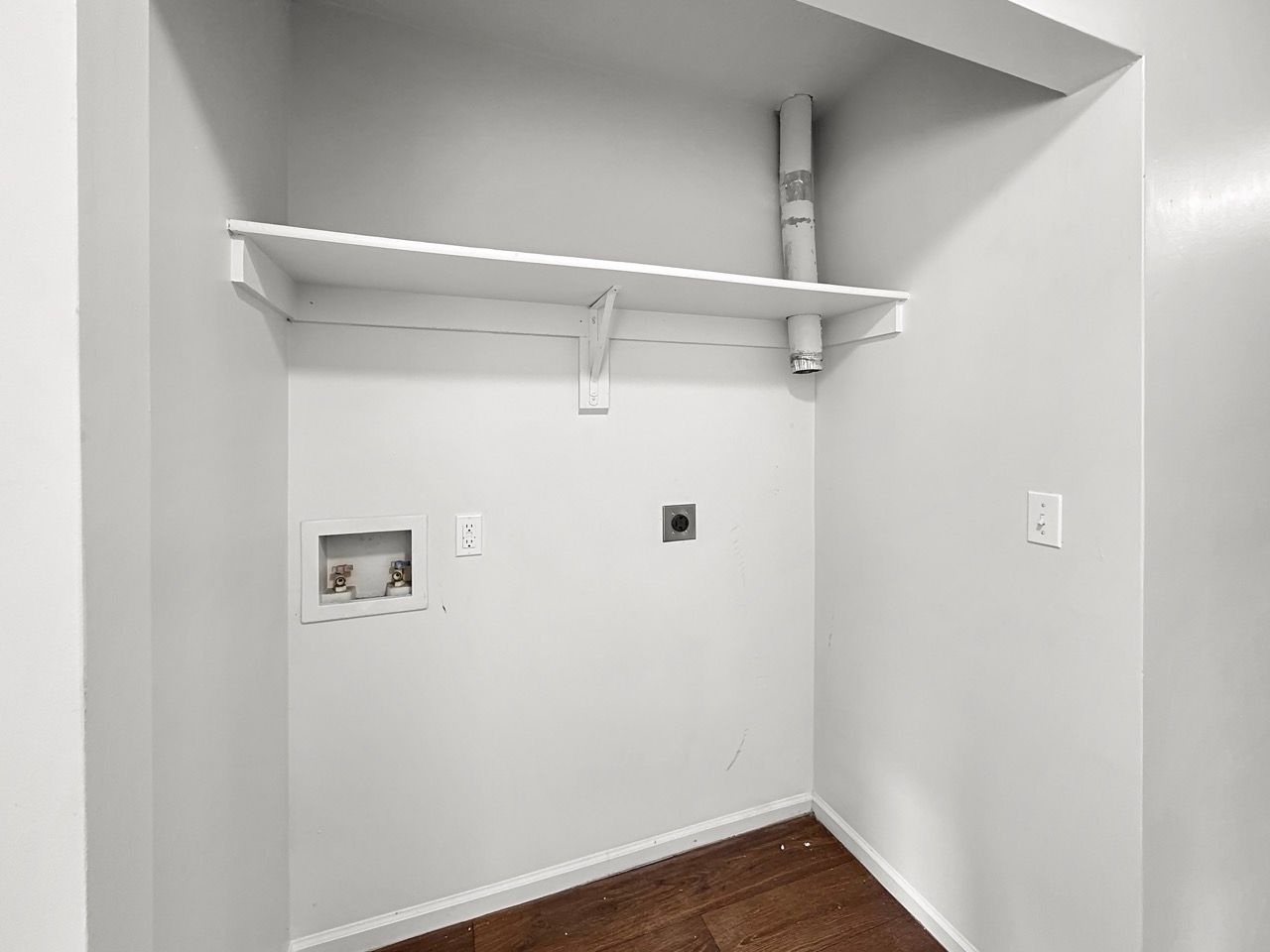 There is a washer and dryer in the laundry room.