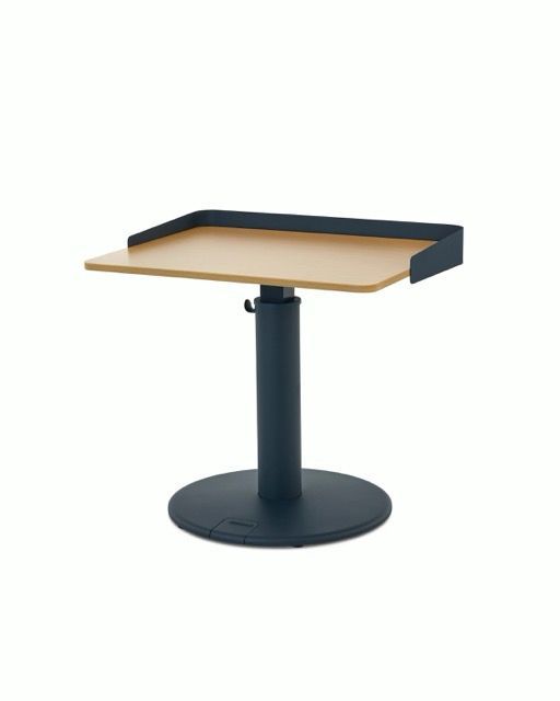 Modern black table lamp with a beige rectangular shade on a round base