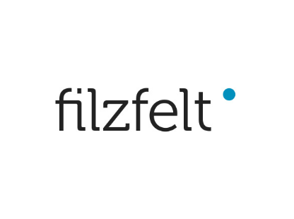 Filzfelt logo in black lowercase letters with a teal dot on a white background