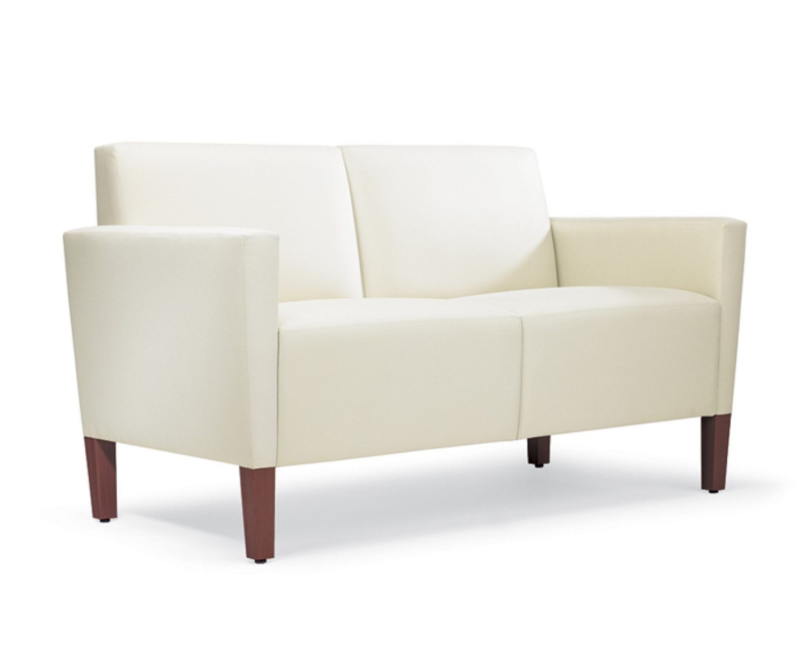 Cream-colored loveseat with dark wooden legs on a white background