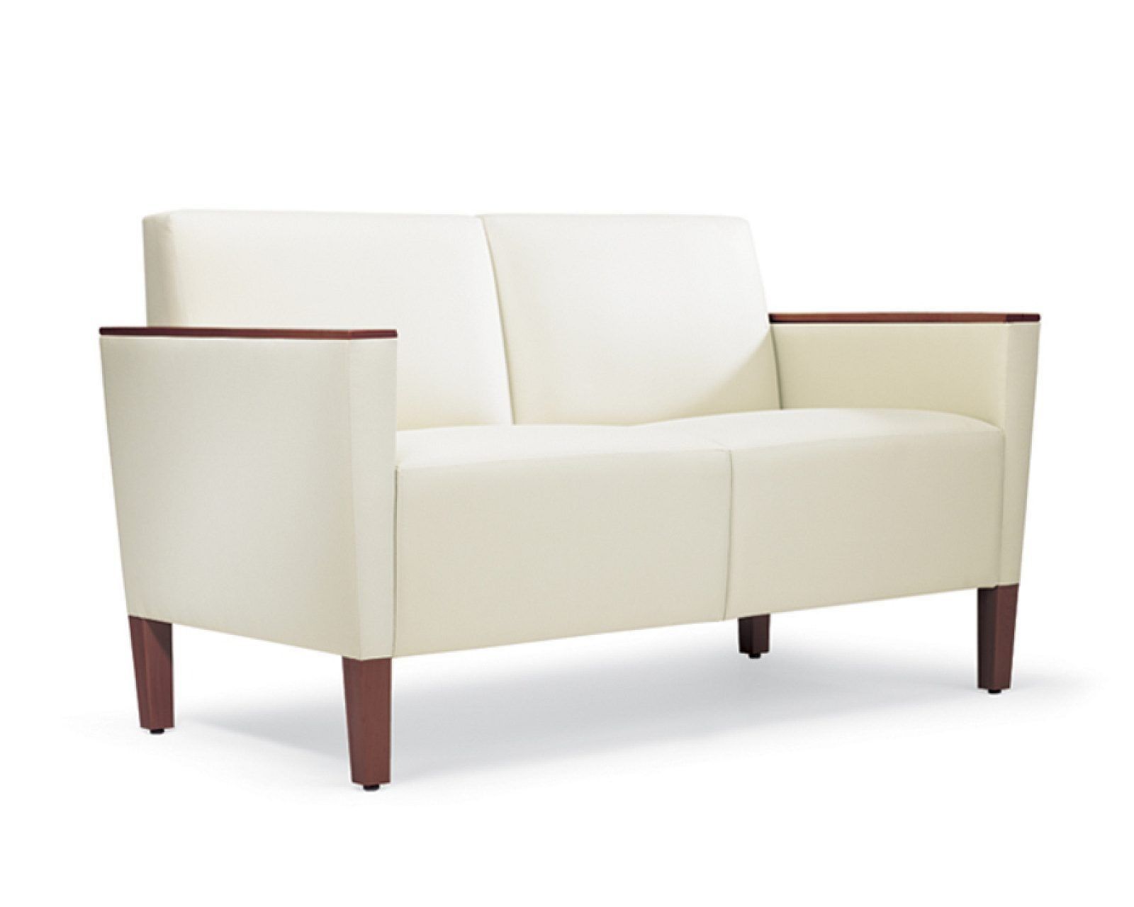 Cream-colored loveseat with dark wooden legs on a white background
