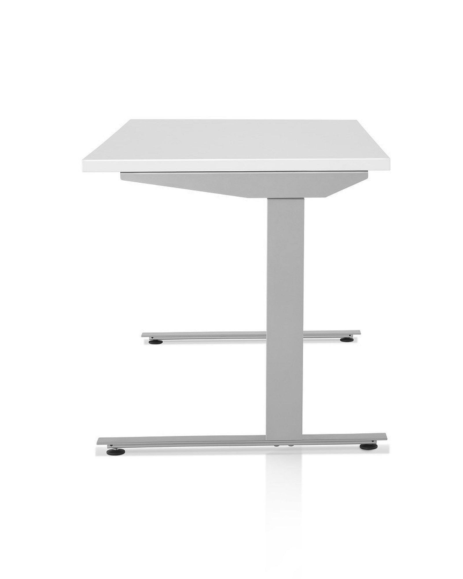 White standing desk with rectangular top and chrome T-shaped footrest base