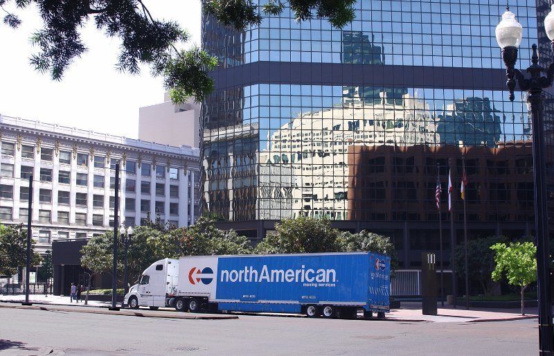 office moving van near buildings
