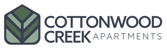 Logo for Cottonwood Creek Apartments; green and gray leaf design with text.