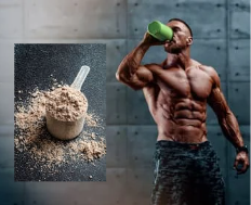 A man is drinking a protein shake from a bottle next to a scoop of protein powder.