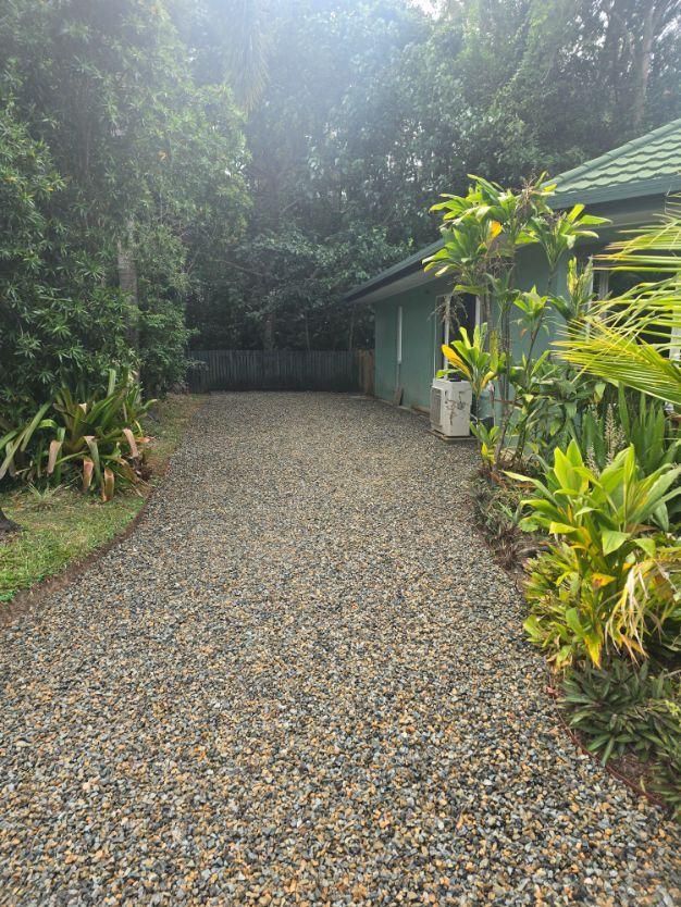 Gravel Driveway Leading to a Light Green House — B&T Earthworks & Civil in Yorkeys Knob, QLD