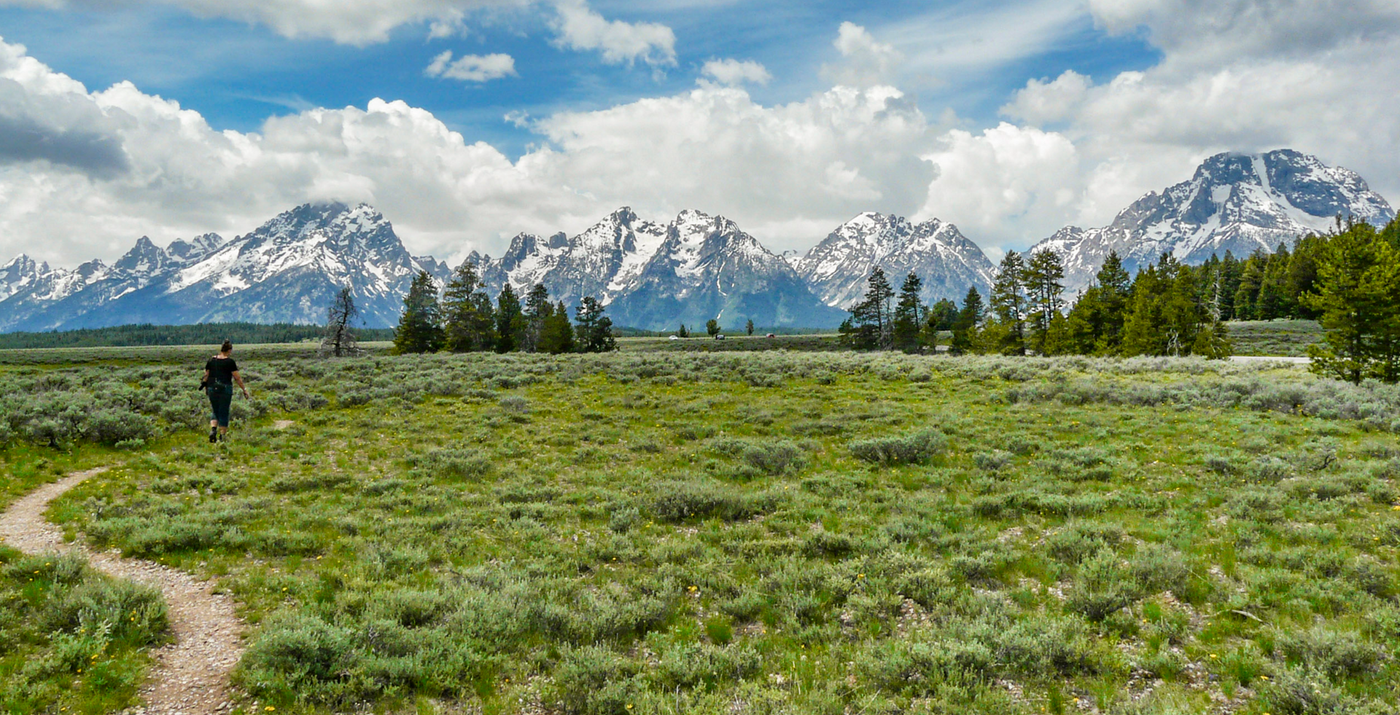 Photo of Françoise Vaal hiking a trail in Grand Teton National Park
