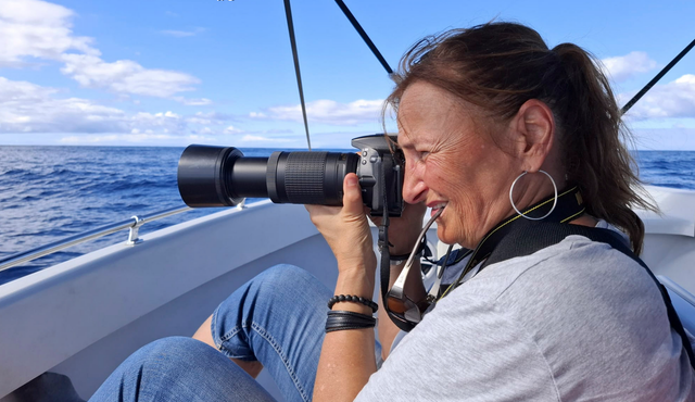 Francoise Vaal photographing on a ship