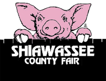 Shiawassee County Fair Logo - pig looking over a fence