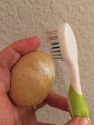 The fluoride soda-soaked egg can be cleaned with a toothbrush