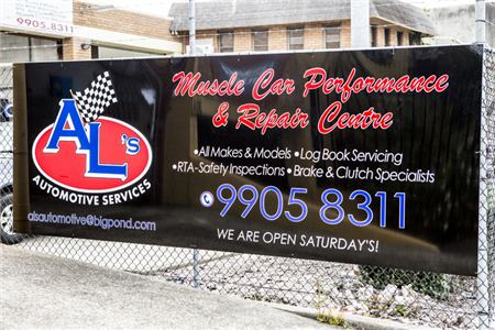 A sign for muscle car performance and repair centre