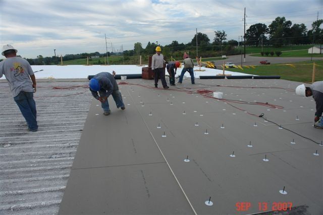 Roof Workers Doing Roof Works — Dyersburg, TN — Frazier Roofing