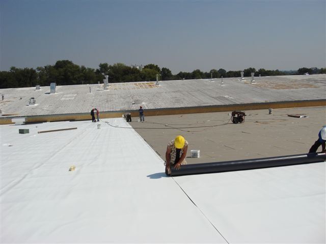 Roof Workers Installing EPDM — Dyersburg, TN — Frazier Roofing