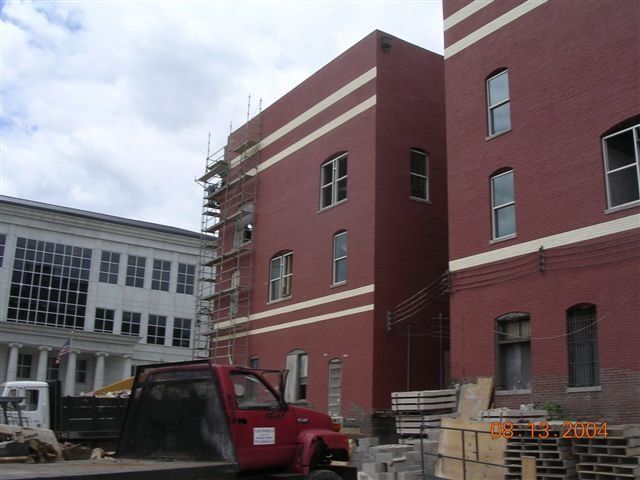Tall Maroon Commercial Building — Dyersburg, TN — Frazier Roofing