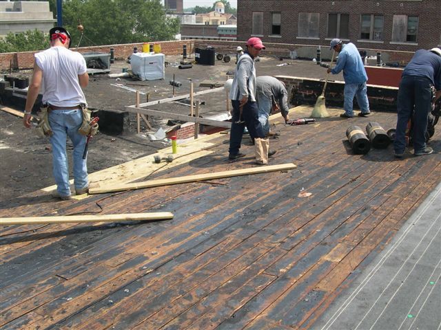Workers Working on the Roof — Dyersburg, TN — Frazier Roofing