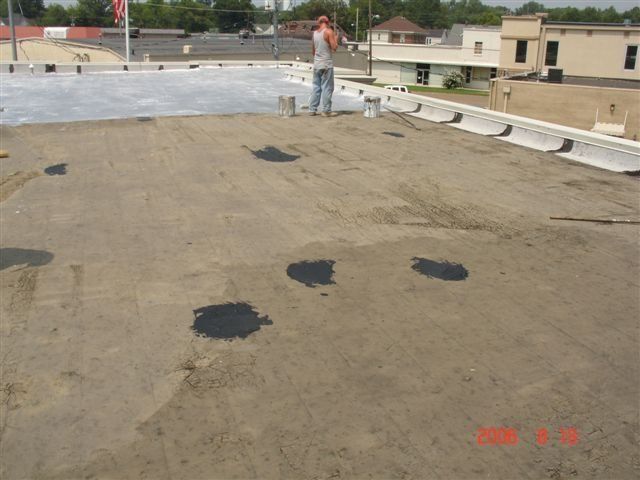 Ongoing Aluminum Roof Coating — Dyersburg, TN — Frazier Roofing