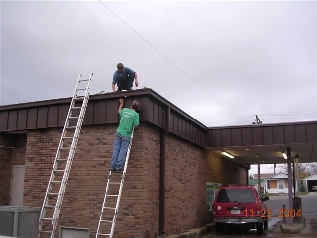 Workers Checking the Roof — Dyersburg, TN — Frazier Roofing