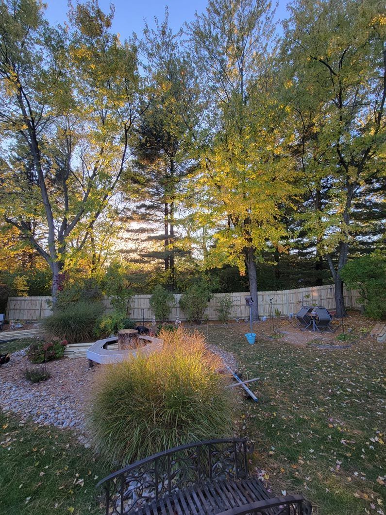 A wood privacy fence in Troy, MI in a backyard in by Elite Wood Fencing