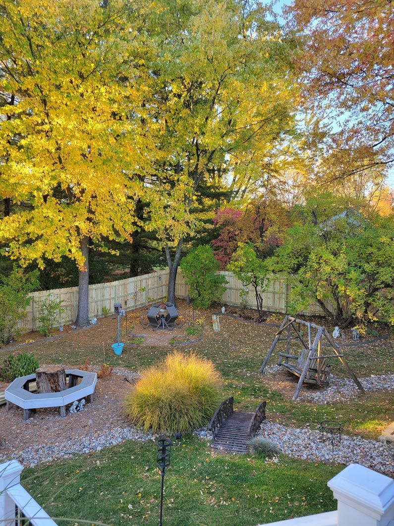 A wood privacy fence in Troy, MI in a backyard in by Elite Wood Fencing