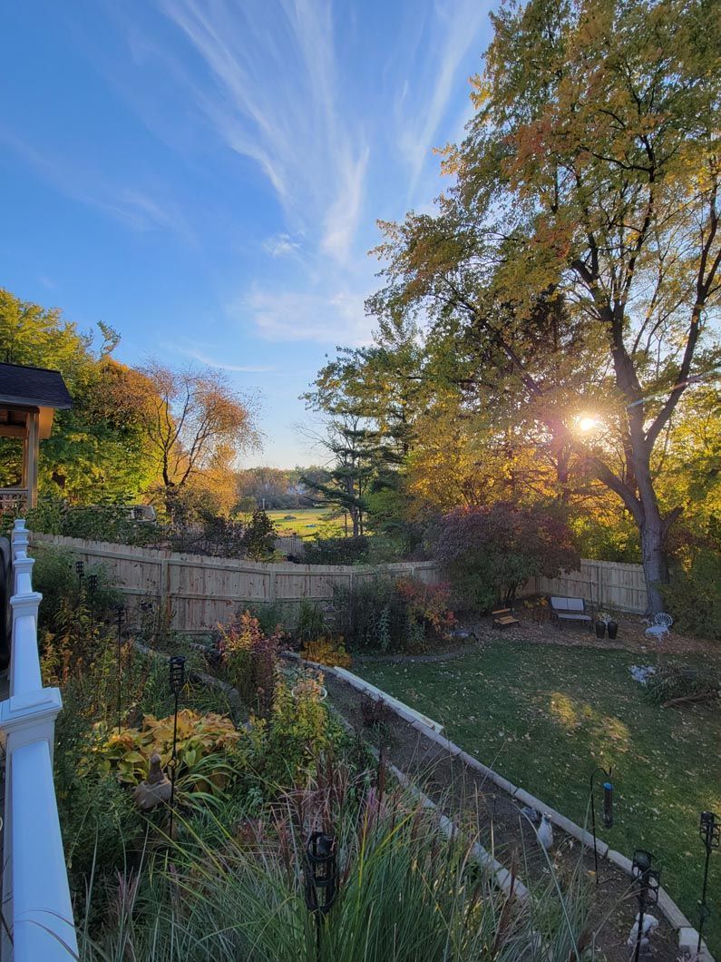 A wood privacy fence in Troy, MI in a backyard in by Elite Wood Fencing