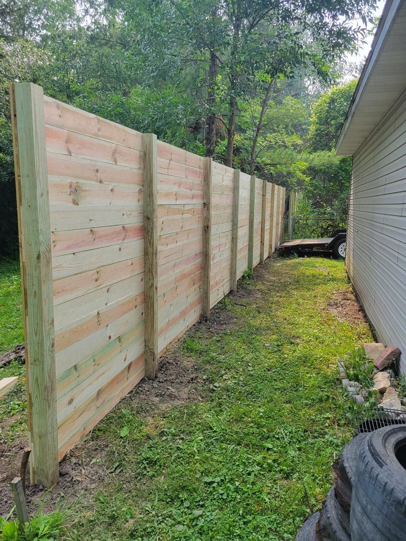 A wood privacy wall in Troy, MI by Elite Wood Fencing