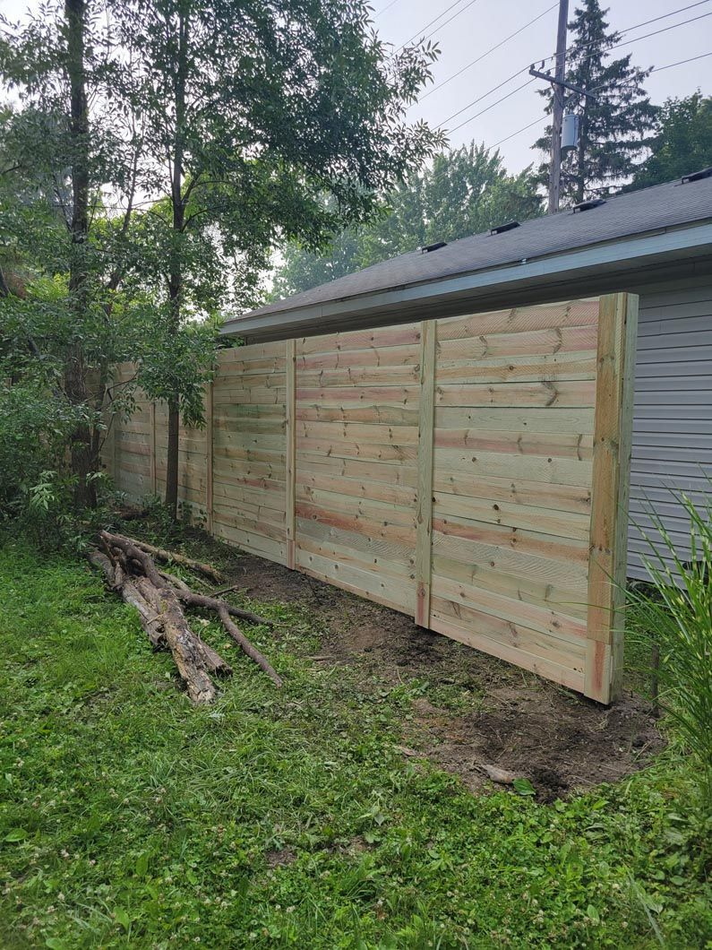 A wood privacy wall in Troy, MI by Elite Wood Fencing