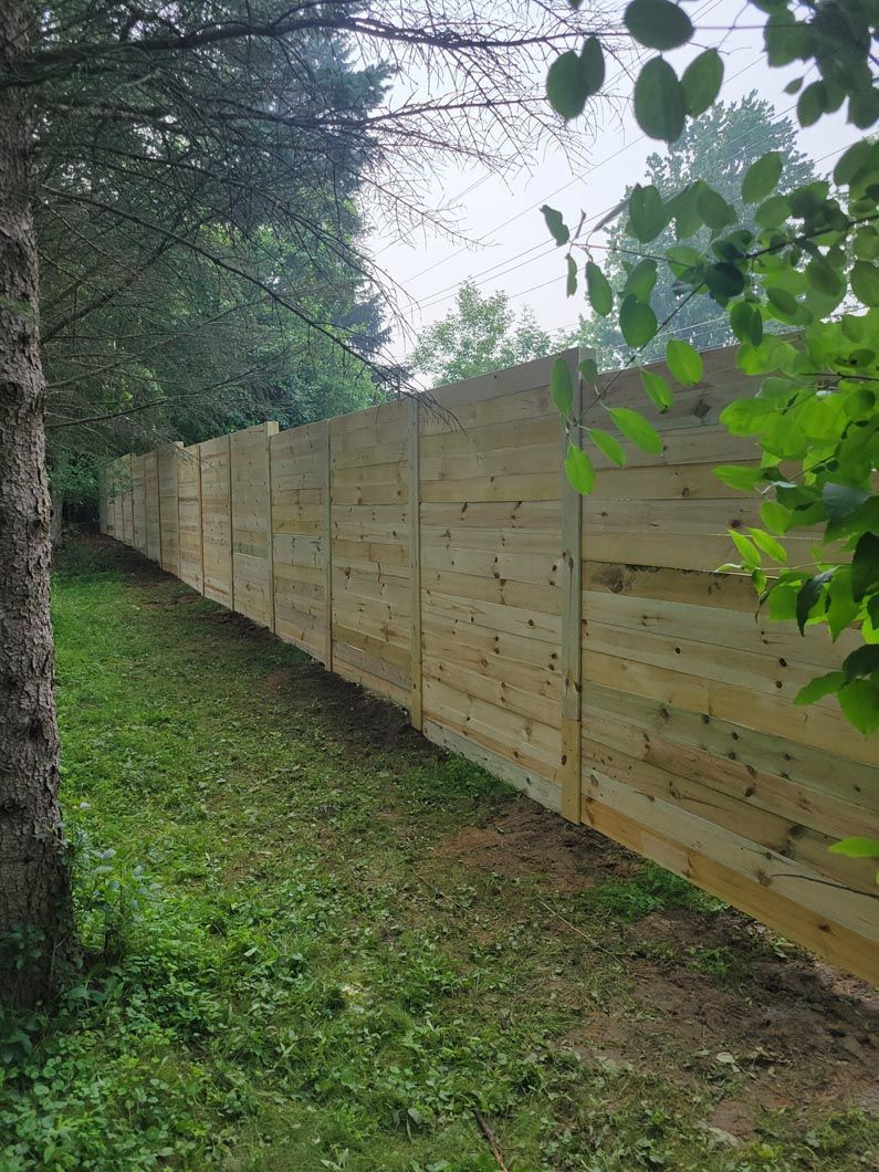 A wood privacy wall in Troy, MI by Elite Wood Fencing
