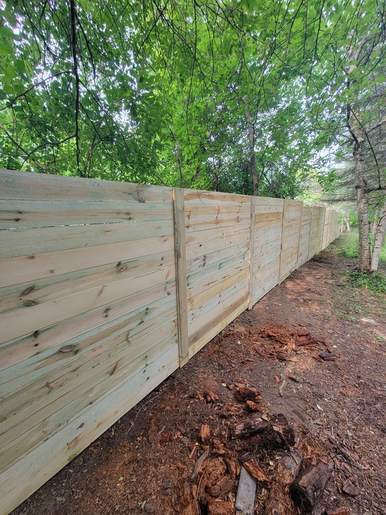 A wood privacy wall in Troy, MI by Elite Wood Fencing