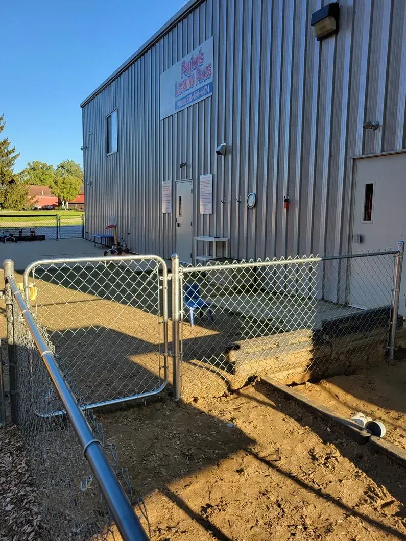 A chain link fence installation in Troy, MI by Elite Wood Fencing