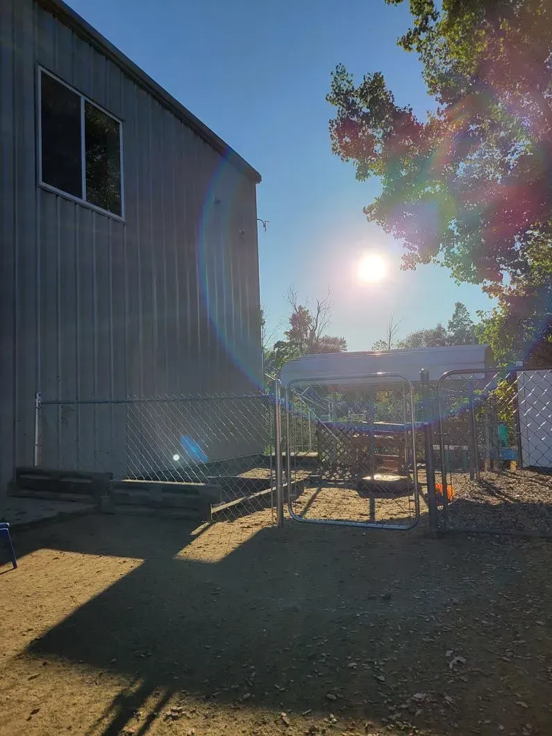 A chain link fence installation in Troy, MI by Elite Wood Fencing