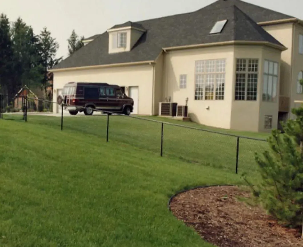 A chain link fence installation in Troy, MI by Elite Wood Fencing