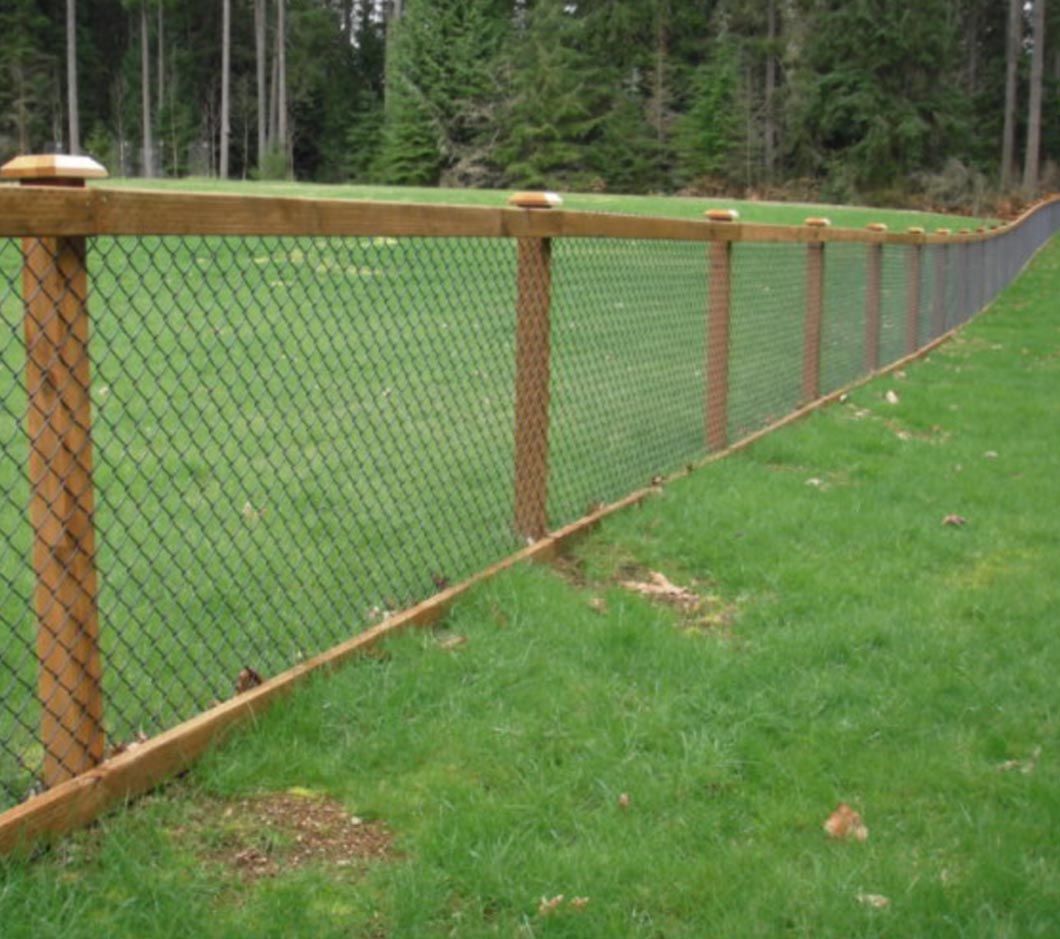 A wood post with aluminum chainlink fence in Troy, MI by Elite Wood Fencing