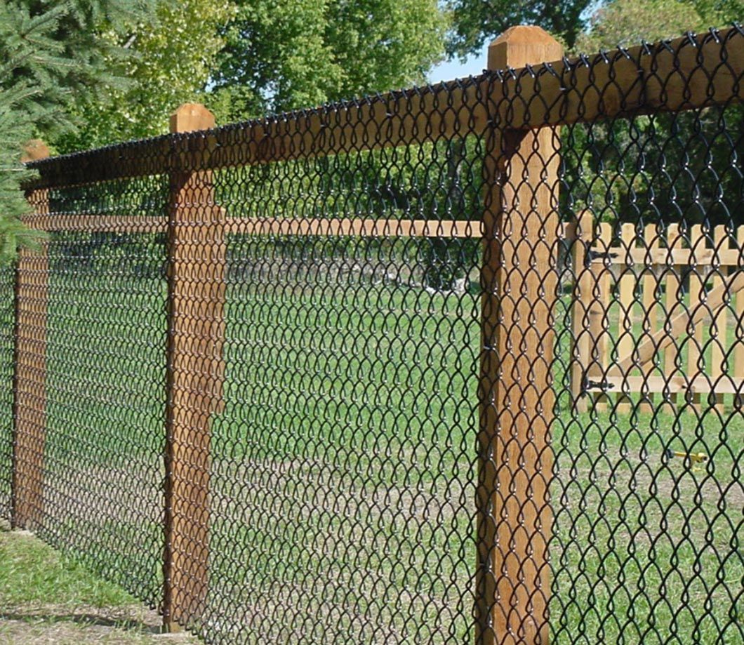 A wood post with aluminum chainlink fence in Troy, MI by Elite Wood Fencing