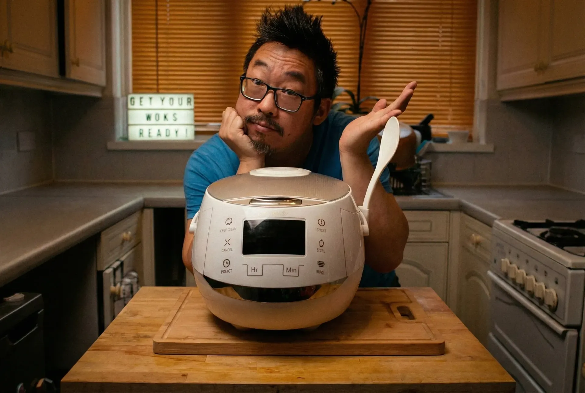 Hand sprinkling seasoning onto chopped vegetables in a stone bowl.